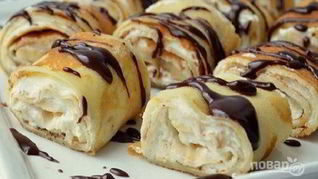 Рецепт Рулетики из блинчиков с творожно-банановым кремом