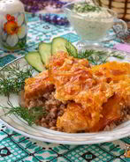 Филе индейки запеченное в сливочно-сырном соусе