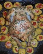 Курица, запеченная с овощами