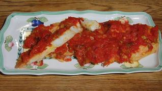 Рецепт Палтус, запеченный с помидорами и сельдереем