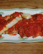 Палтус, запеченный с помидорами и сельдереем