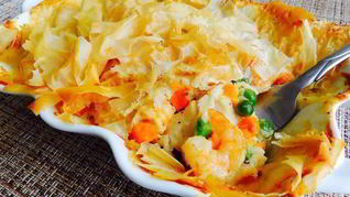 Рецепт Рыба с овощами, запеченная под тестом фило