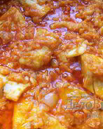 Тушеная рыба в томатном соусе