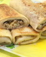 Фаршированные блины с грибами и сыром
