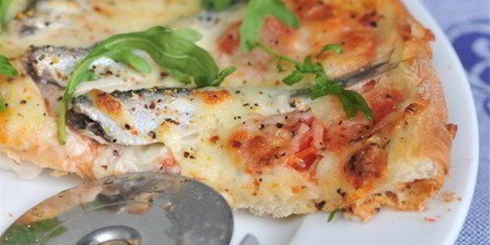 Как приготовить пиццу с томатами и анчоусами